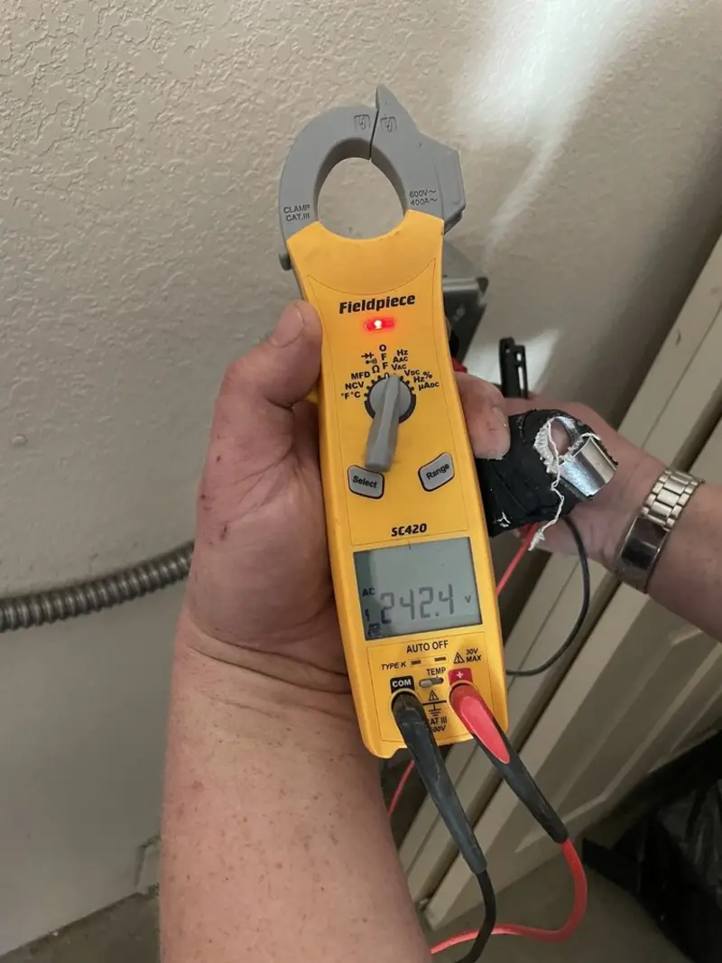 Voltage testing with clamp meter during Generator Installation in Hillcrest